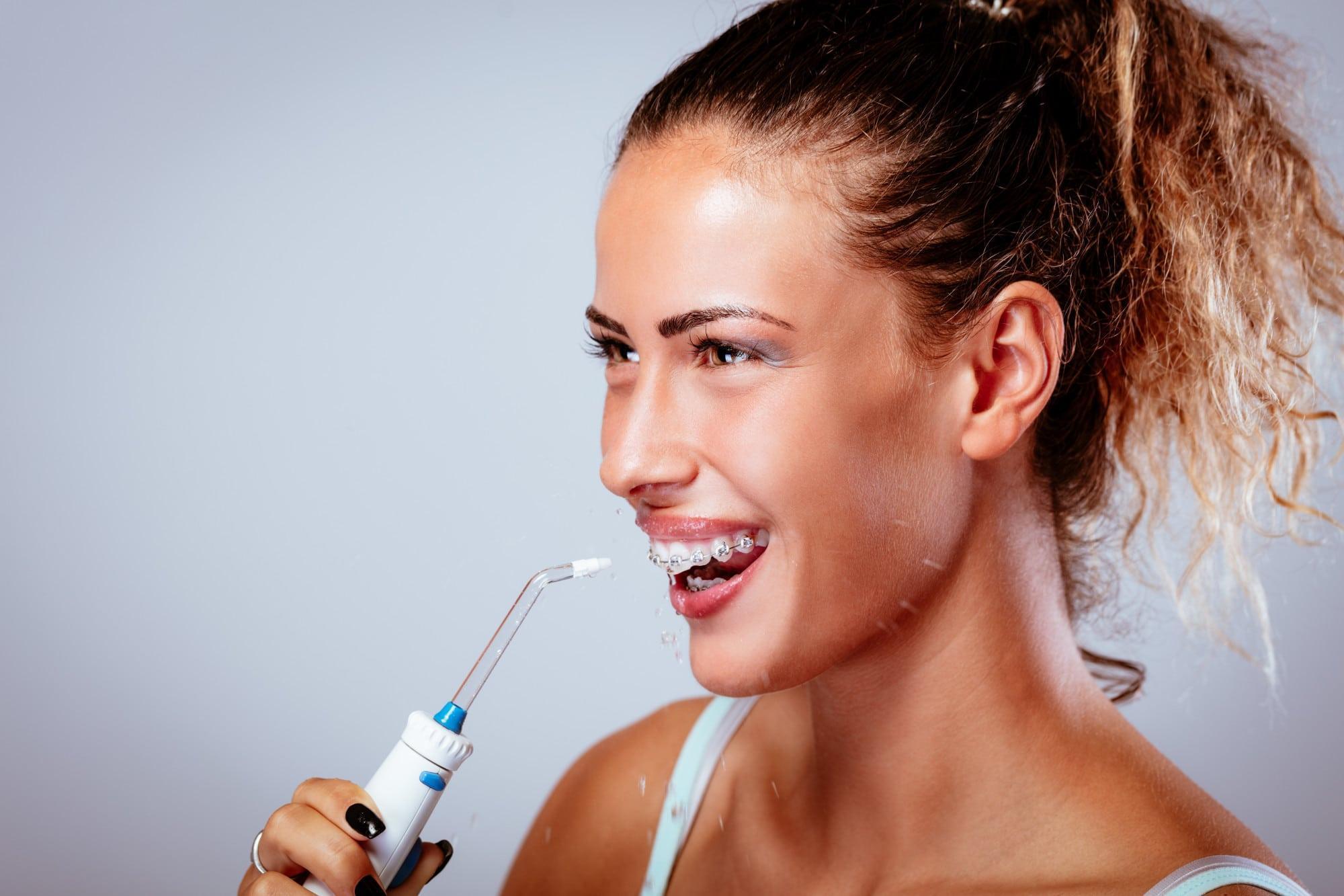 irrigador bucal agua limpieza dental